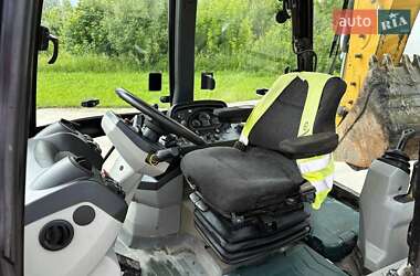 Экскаватор погрузчик Caterpillar 444 2014 в 