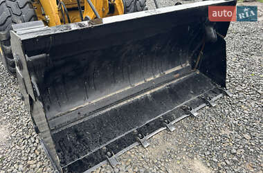 Фронтальный погрузчик Caterpillar 906 2012 в 