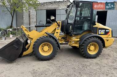 Фронтальні навантажувачі Caterpillar 908 2011 в Костопілі