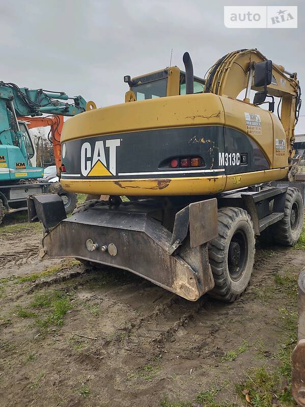 Колісний екскаватор Caterpillar M313 2006 в Рівному