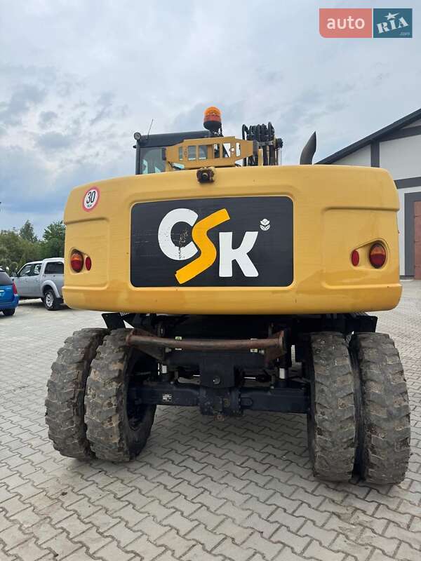 Колесный экскаватор Caterpillar M313 2012 в Долине