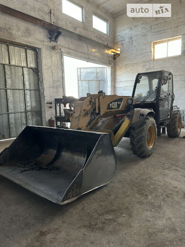 Телескопический погрузчик Caterpillar TH 414 2009 в Одессе