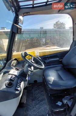 Телескопічні навантажувачі Caterpillar TH 2009 в 