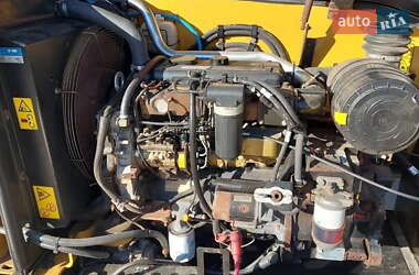 Телескопический погрузчик Caterpillar TH 2009 в 