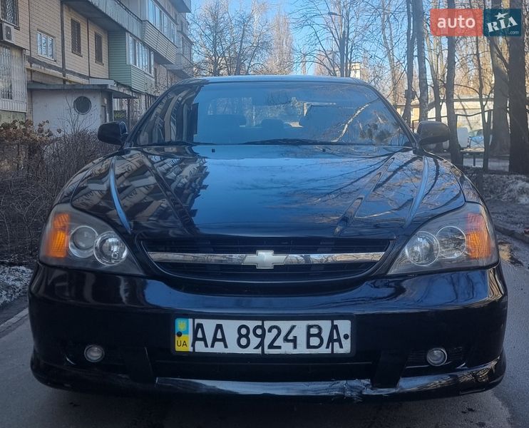 2005 Chevrolet Evanda, VIN KL1LF69ZE6B186615:plate — фото 1 (autoria)