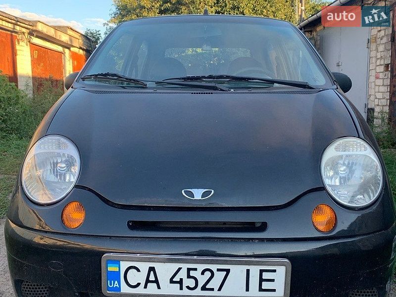 2013 Daewoo Matiz, VIN XWB4A11EDDA577004:plate — photo 1 (autoria)