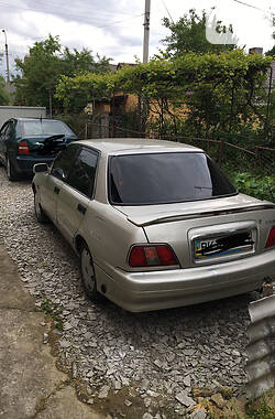 Лифтбек Daihatsu Applause 1999 в 
