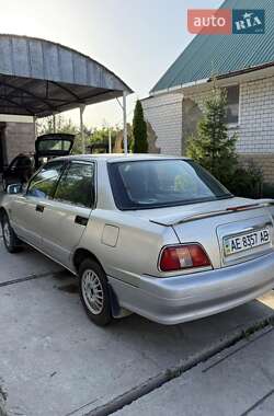 Лифтбек Daihatsu Applause 1999 в 