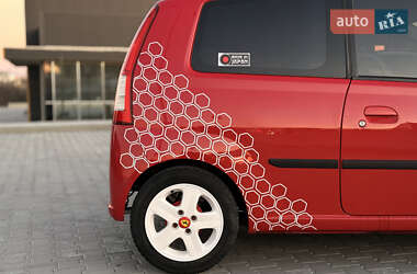 Купе Daihatsu Cuore 2006 в 