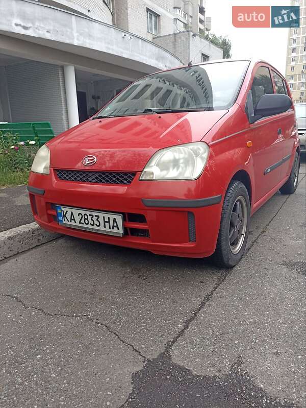 Хэтчбек Daihatsu Cuore 2003 в 