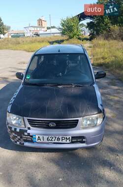 Хэтчбек Daihatsu Cuore 2003 в 
