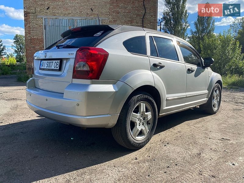 2006 Dodge Caliber, VIN 1B3HBG8B17D151476:plate — zdjęcie 1 (autoria)