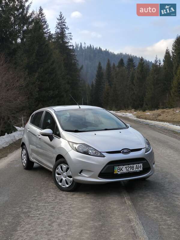 2010 Ford Fiesta, VIN WF0JXXGAJJAR25142:plate — фото 1 (autoria)
