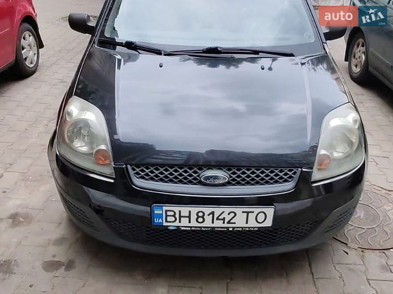 2007 Ford Fiesta, VIN WF0HXXGAJH7L63122:plate — фото 1 (autoria)