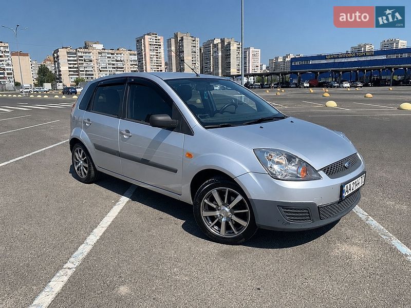 2008 Ford Fiesta, VIN WF0HXXWPJH8L69909:plate — фото 1 (autoria)