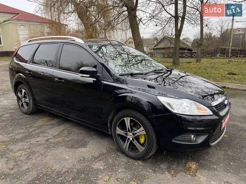 2010 Ford Focus, VIN WF0SXXGCDSAS22208:plate — фото 1 (autoria)
