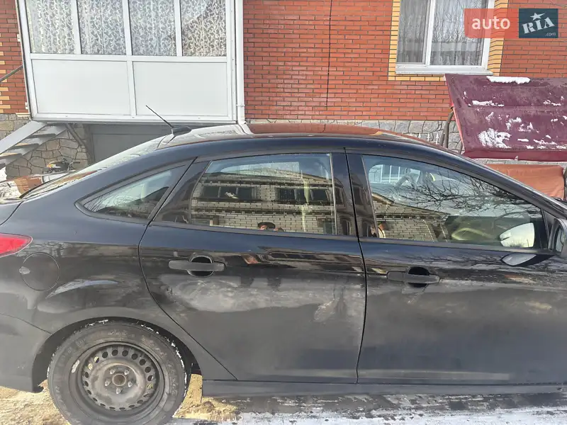 Ford Focus 2016 VIN 1FADP3E22GL361530 фото оголошення 21 з 69