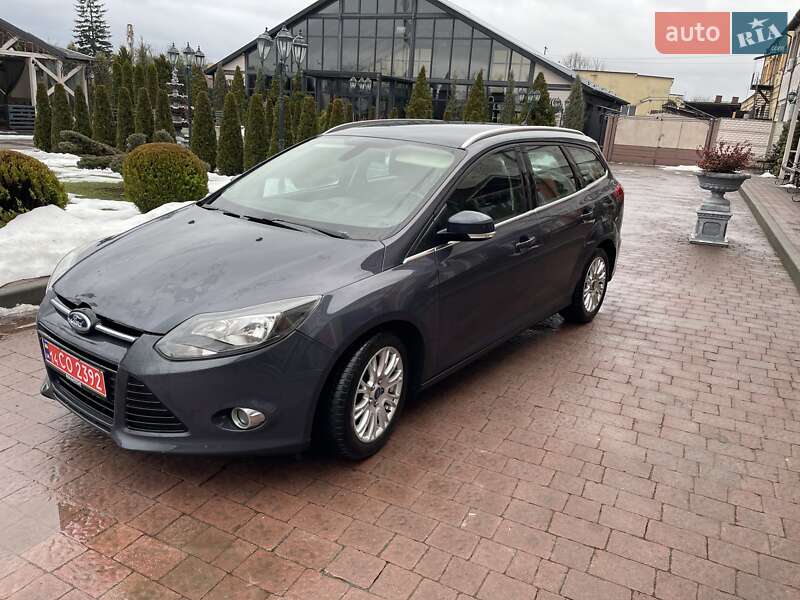 2012 Ford Focus, VIN WF0LXXGCBLCB70303:plate — фото 1 (autoria)