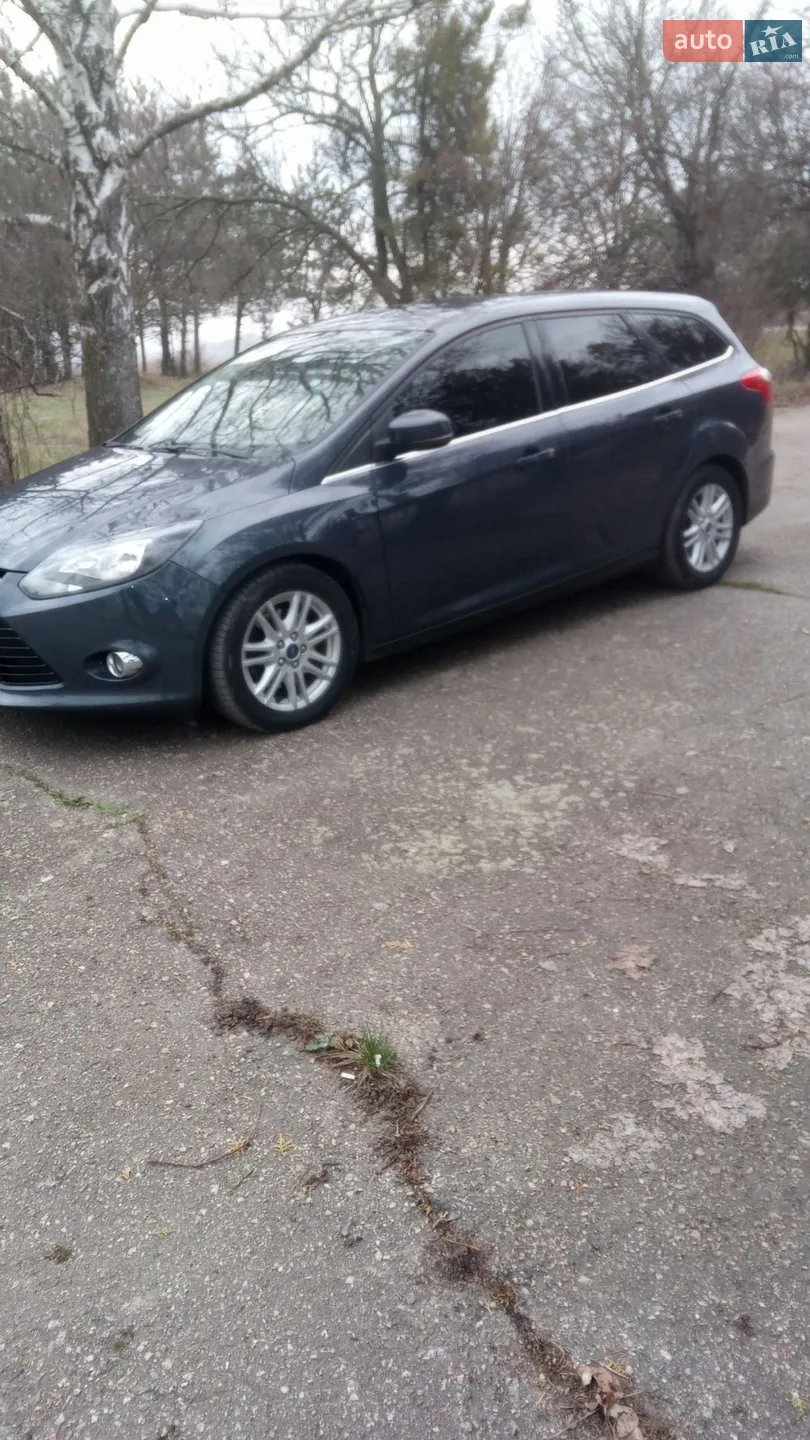 Ford Focus 2013 VIN WF0LXXGCBLDA18745 фото оголошення 8 з 22