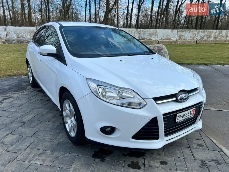 2011 Ford Focus, VIN WF0KXXGCBKBD40274:plate — фото 1 (autoria)