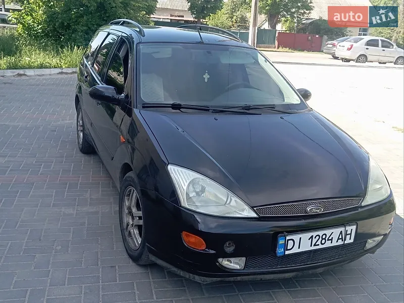 Ford Focus 2003 VIN WF0NXXGCDN3U79179 фото оголошення 12 з 41