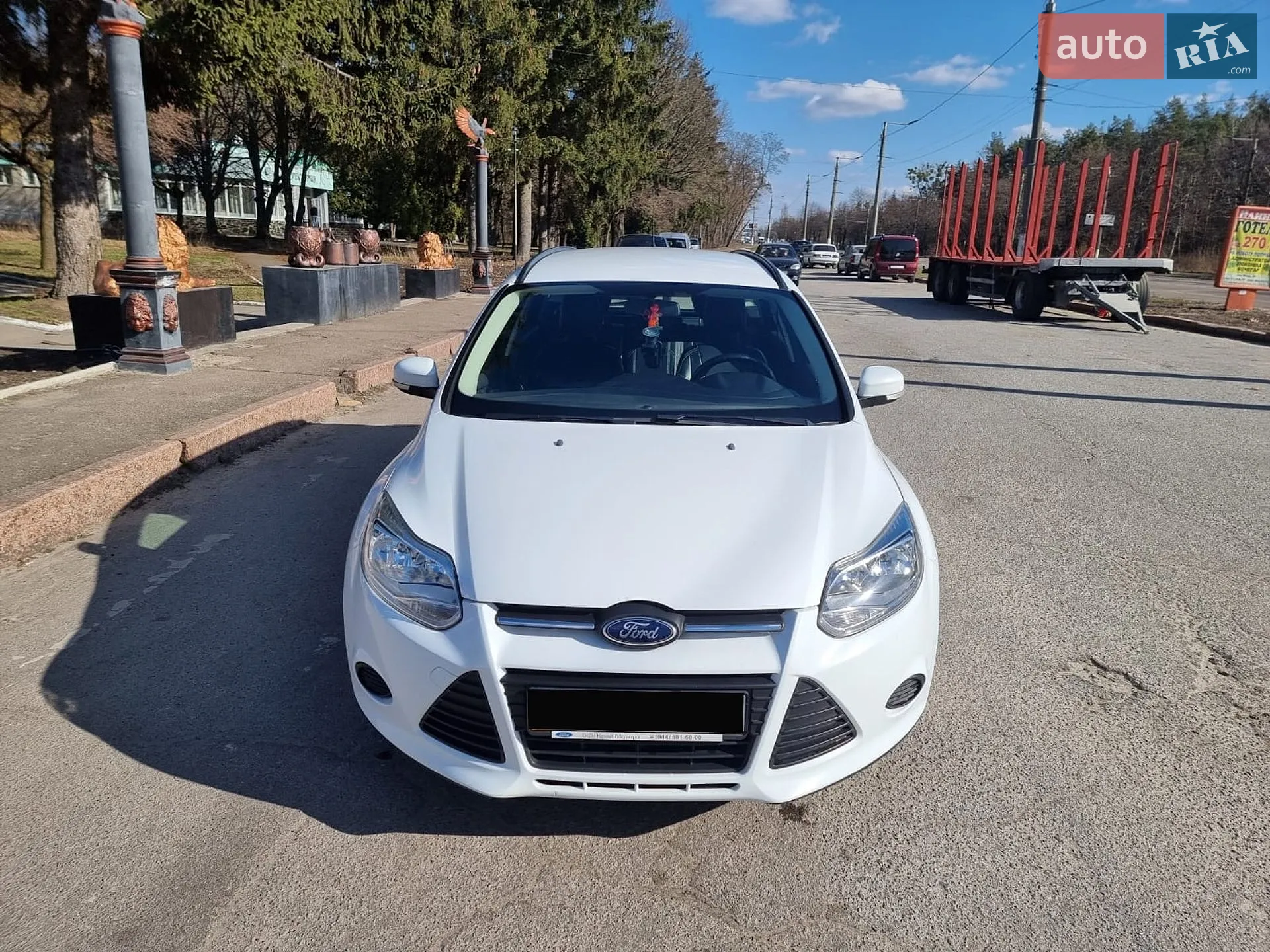 Ford Focus 2013 VIN WF0LXXGCBLDK02814 фото оголошення 2 з 18