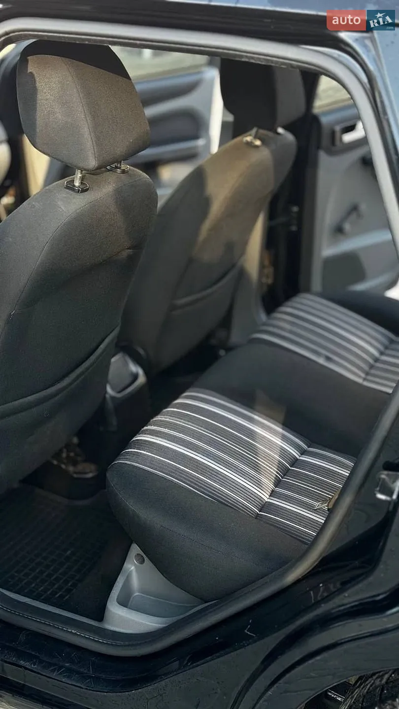 Ford Focus 2009 VIN WF0SXXGCDS9G41097 фото оголошення 12 з 13