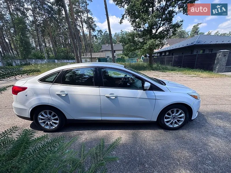 Ford Focus 2016 VIN 1FADP3F29GL325588 фото оголошення 4 з 62