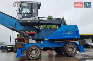 Экскаватор погрузчик Fuchs MHL-350 2010 в 