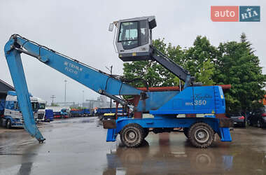 Экскаватор погрузчик Fuchs MHL-350 2010 в 