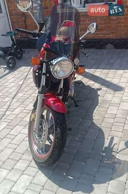 Мотоцикл Без обтекателей (Naked bike) Honda CB 500 1999 в 