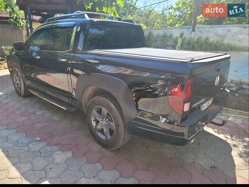 Honda Ridgeline 2021 VIN 5FPYK3F78MB005478 фото оголошення 4 з 54
