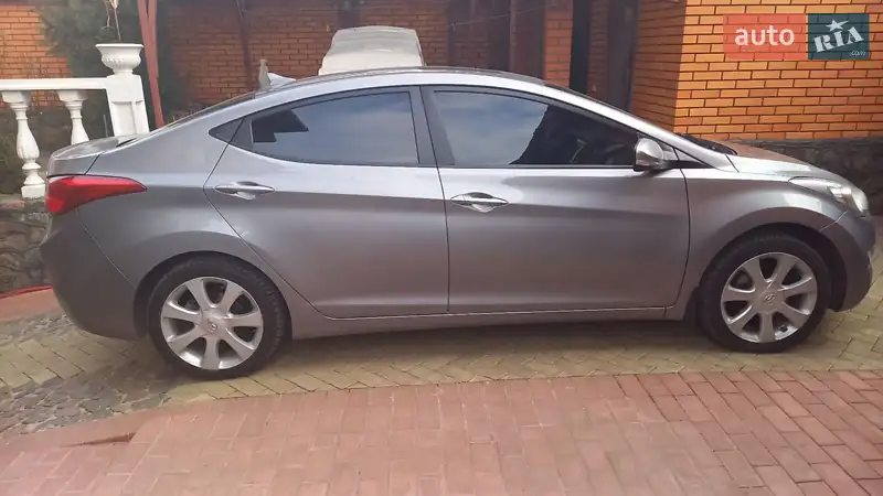 Hyundai Elantra 2012 VIN KMHDH4AE7CU493860 фото оголошення 4 з 64
