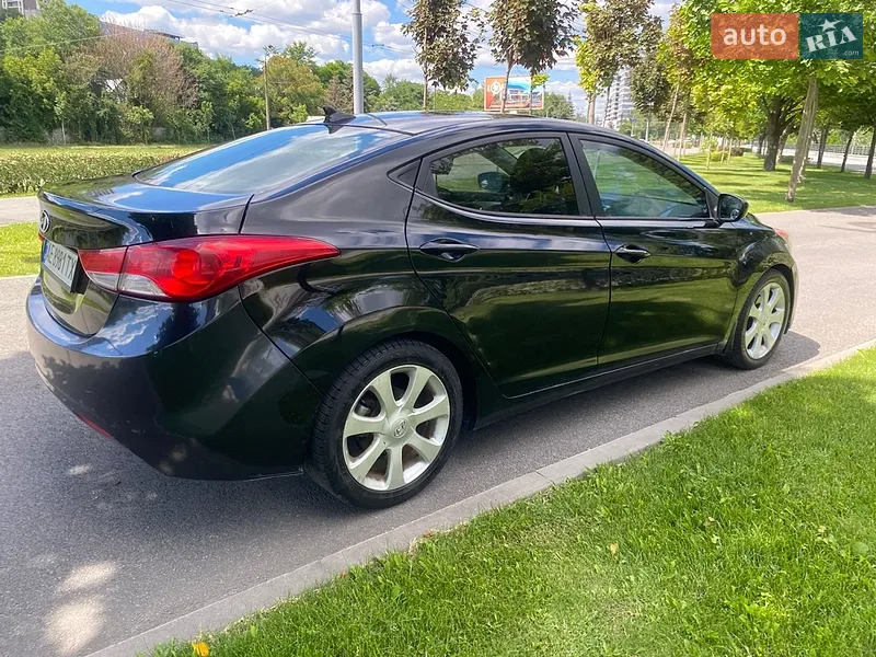 Hyundai Elantra 2012 VIN 5NPDH4AE2DH175452 фото оголошення 4 з 51