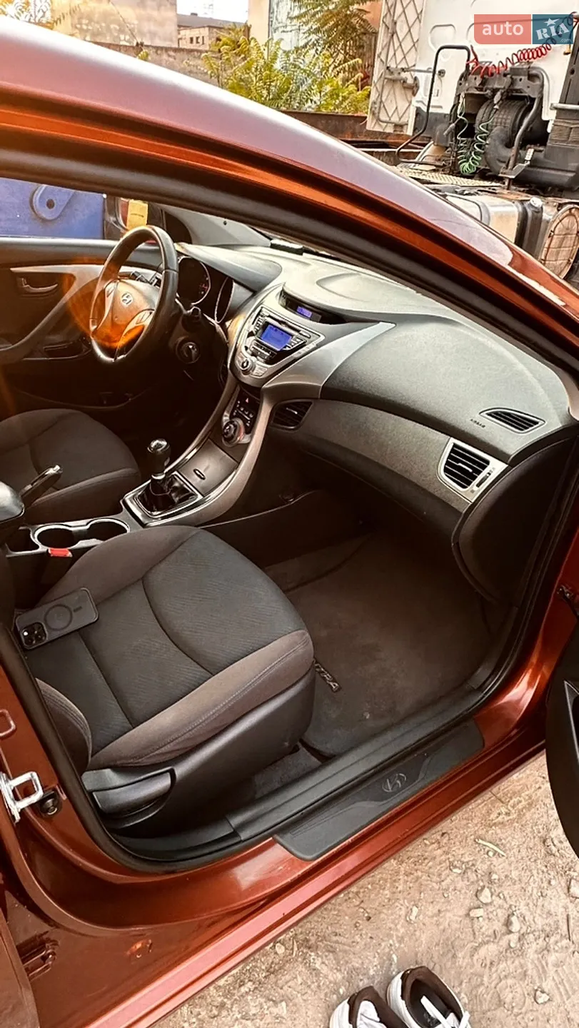 Hyundai Elantra 2013 VIN KMHDH41CADU691868 фото оголошення 11 з 26