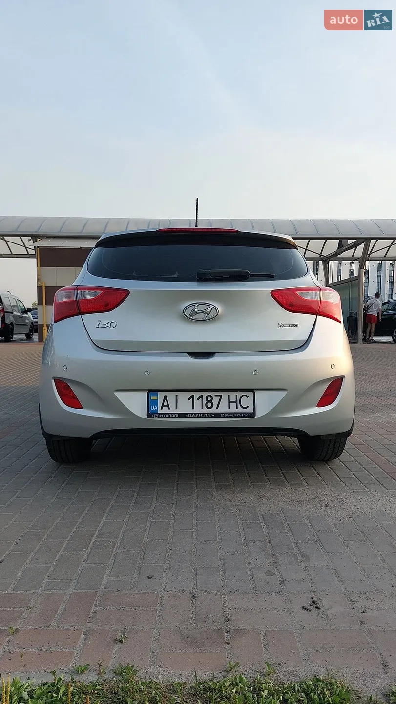 Hyundai i30 2014 VIN TMAD251UBEJ236211 фото оголошення 13 з 14