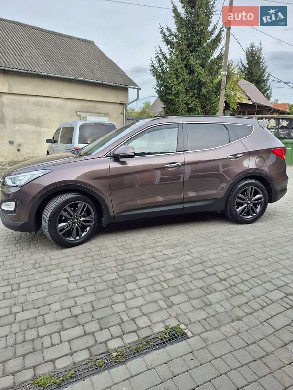 Внедорожник / Кроссовер Hyundai Santa FE 2014 в Нововолынске