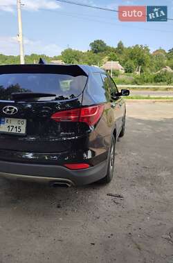 Внедорожник / Кроссовер Hyundai Santa FE 2014 в 