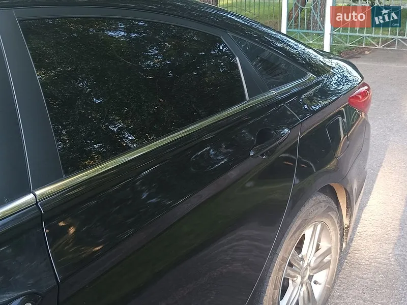 Hyundai Sonata 2013 VIN KMHEC41LBDA538917 фото оголошення 7 з 56