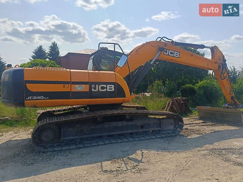 Экскаватор погрузчик JCB JS 240NC 2012 в 