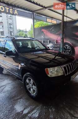 Внедорожник / Кроссовер Jeep Grand Cherokee 2000 в 
