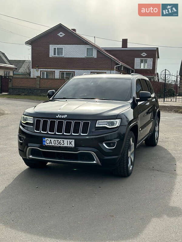 Внедорожник / Кроссовер Jeep Grand Cherokee 2013 в 
