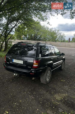 Внедорожник / Кроссовер Jeep Grand Cherokee 2002 в 