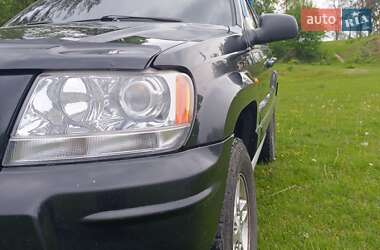 Внедорожник / Кроссовер Jeep Grand Cherokee 2004 в 