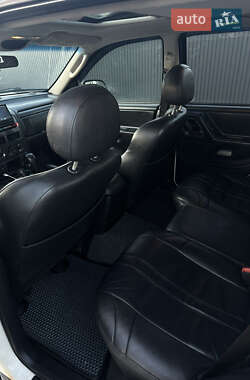Внедорожник / Кроссовер Jeep Grand Cherokee 2003 в 