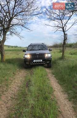 Внедорожник / Кроссовер Jeep Grand Cherokee 2004 в 