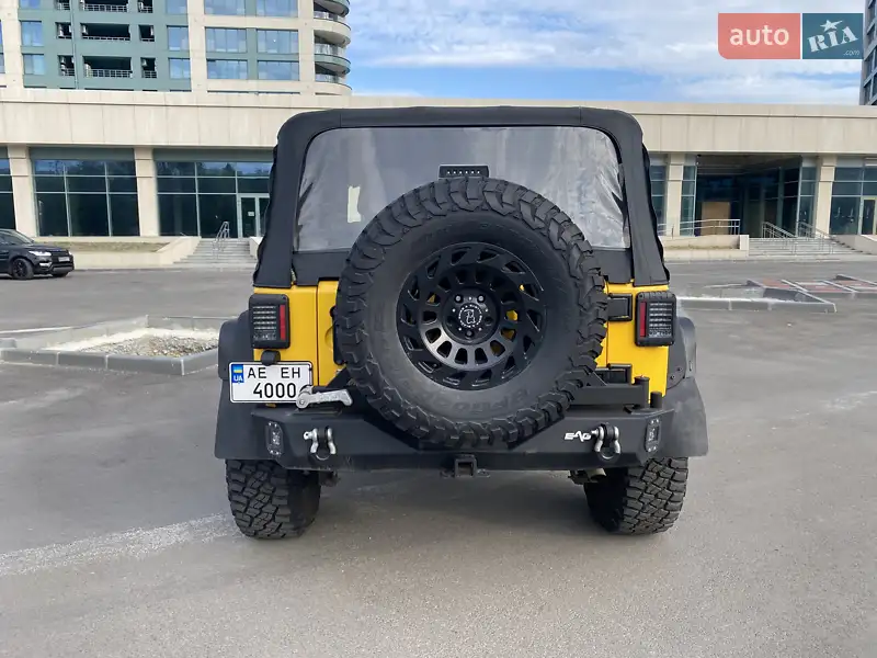 Jeep Wrangler 2015 VIN 1C4BJWCG5FL736361 фото оголошення 4 з 55