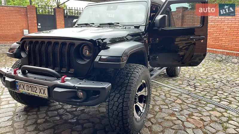 Jeep Wrangler 2020 VIN 1C4HJXFG3LW217623 фото оголошення 4 з 89