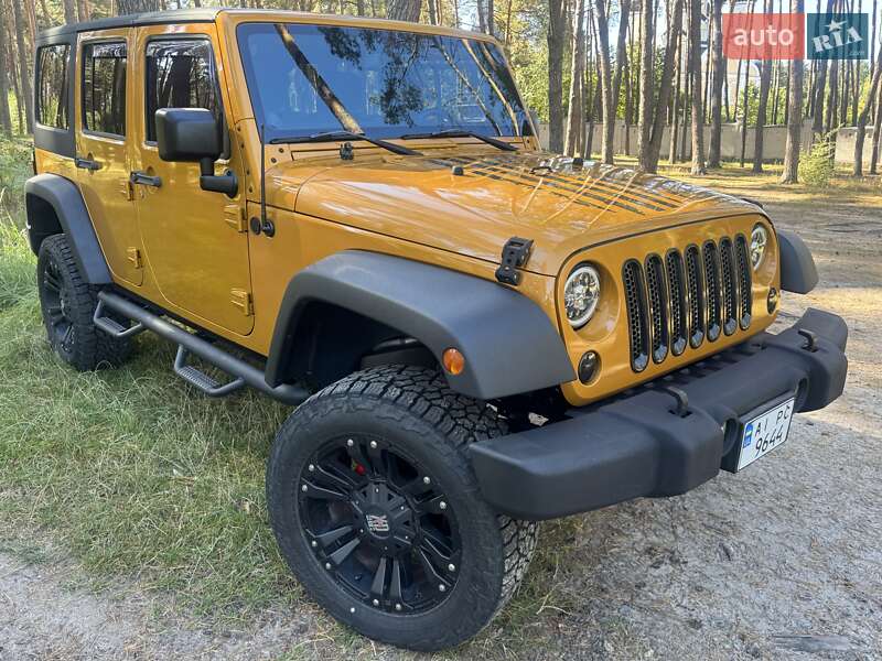 Внедорожник / Кроссовер Jeep Wrangler 2014 в 