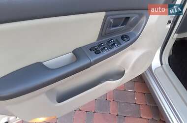 Хэтчбек Kia Cerato 2006 в  фото 15 Хэтчбек Kia Cerato 2006 в